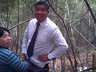Mature Asian Woman Gets Her Big Tits Pounded by a Younger Man