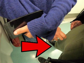 A woman gives me a handjob in public on a subway train